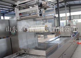 泡椒凤爪全自动称重连续式真空包装机